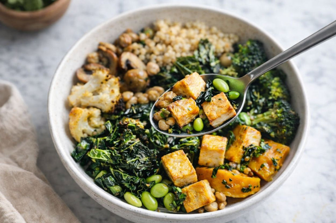 Low carb plant based bowl with tofu vegetables spoon